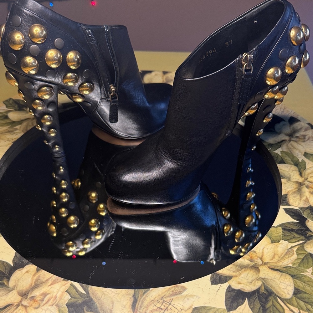 Gucci “Babouska” Black and Gold Heeled Booties
